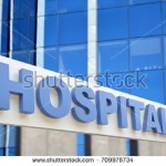 stock-photo-hospital-building-sign-closeup-with-sky-reflecting-in-the-glass-d-rendering-709976734