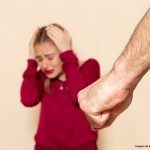 front-view-young-female-in-red-shirt-suffers-from-physical-violence-on-t...